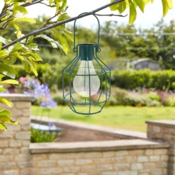 House Beautiful Firefly Solar Powered Caged Lantern 10 House Beautiful Firefly Solar Powered Caged Lantern -Chic Lighting Store 13280804 1194933437034953